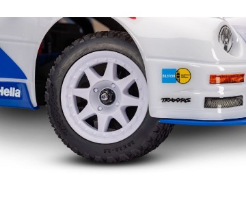 Traxxas Mini Rally VXL: mini-scale rally car with Ford RS200 clipless body, fully assembled, Ready-To-Race®, with TQi™ 2.4 GHz radio system with TSM®, and Velineon® VXL-3s™ brushless power system. Includes 2-cell LiPo battery and 2-amp USB-C charger