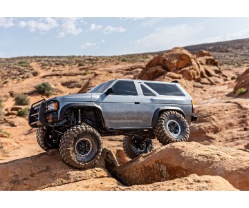 TRX-4 Scale and Trail™ crawler with Nissan® Pathfinder® Body: 1/10 scale 4X4 trail truck, fully-assembled, waterproof electronics, Ready-To-Drive®, with TQi™ 2.4 GHz 4-channel radio system, XL-5™ HV speed control, high/low transmission, remote locking dif