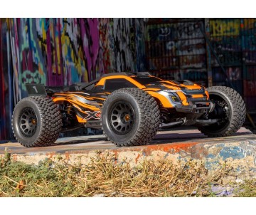 Traxxas XRT: Brushless Electric Race Truck with TQi Traxxas Link Enabled 2.4GHz Radio System, Velineon VXL-8s brushless ESC (fwd/rev), and Traxxas Stability Management (TSM) - Orange
