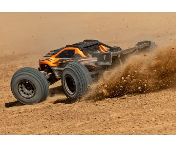 Traxxas XRT: Brushless Electric Race Truck with TQi Traxxas Link Enabled 2.4GHz Radio System, Velineon VXL-8s brushless ESC (fwd/rev), and Traxxas Stability Management (TSM) - Orange