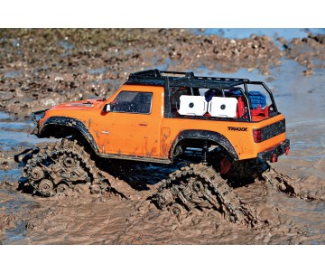 Traxxas TRX-4 with Deep-Terrain Traxx with Tires and Wheels: 1/10 Scale 4WD Electric Truck - Orange. Ready-to-Race with TQ 2.4GHz Radio System, XL-5 HV ESC (fwd/rev) and Titan 550 motor and Painted Clipless Body (Requires battery and charger)