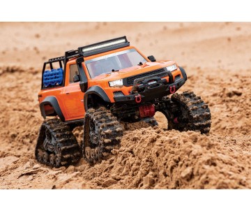 Traxxas TRX-4 with Deep-Terrain Traxx with Tires and Wheels: 1/10 Scale 4WD Electric Truck - Orange. Ready-to-Race with TQ 2.4GHz Radio System, XL-5 HV ESC (fwd/rev) and Titan 550 motor and Painted Clipless Body (Requires battery and charger)
